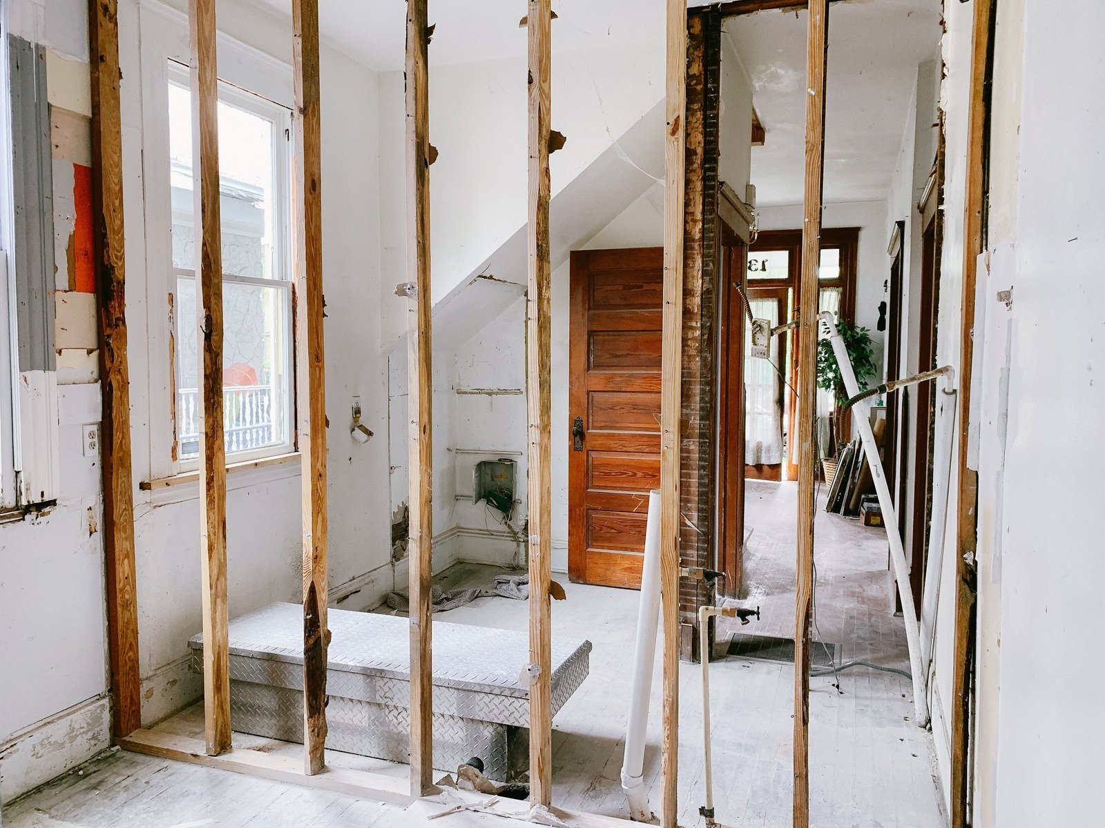 Interior stripped back to framing mid-project, ready for rebuild